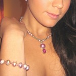 A suite with pink pearl bracelet